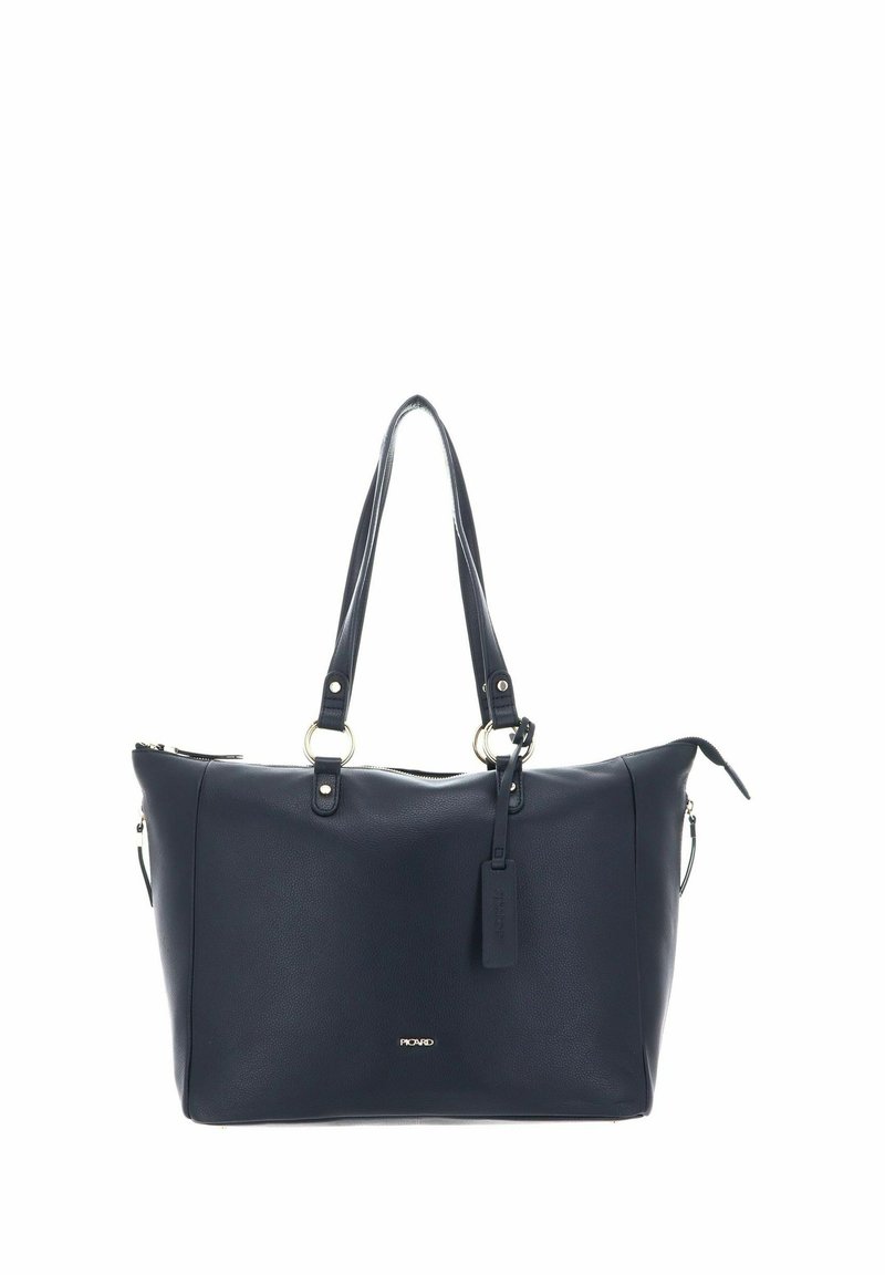 Sac fourre-tout en cuir bleu marine foncé avec double anses, fermeture éclair et quincaillerie dorée. Il dispose d'un logo bien visible et d'une étiquette amovible.