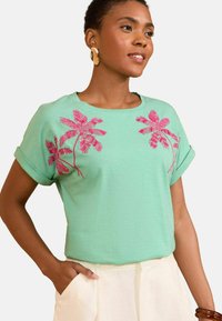 Unselected, aqua and pink embellished palm