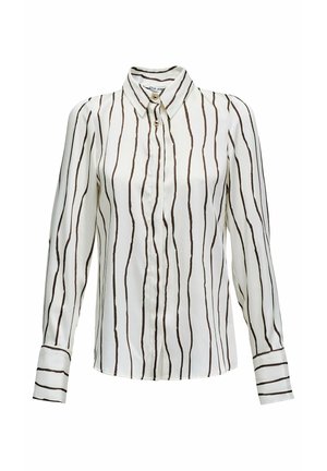 Blusa blanca con rayas verticales marrones, con botones al frente, cuello puntiagudo y mangas largas con detalles en los puños. Tejido suave y ligero.