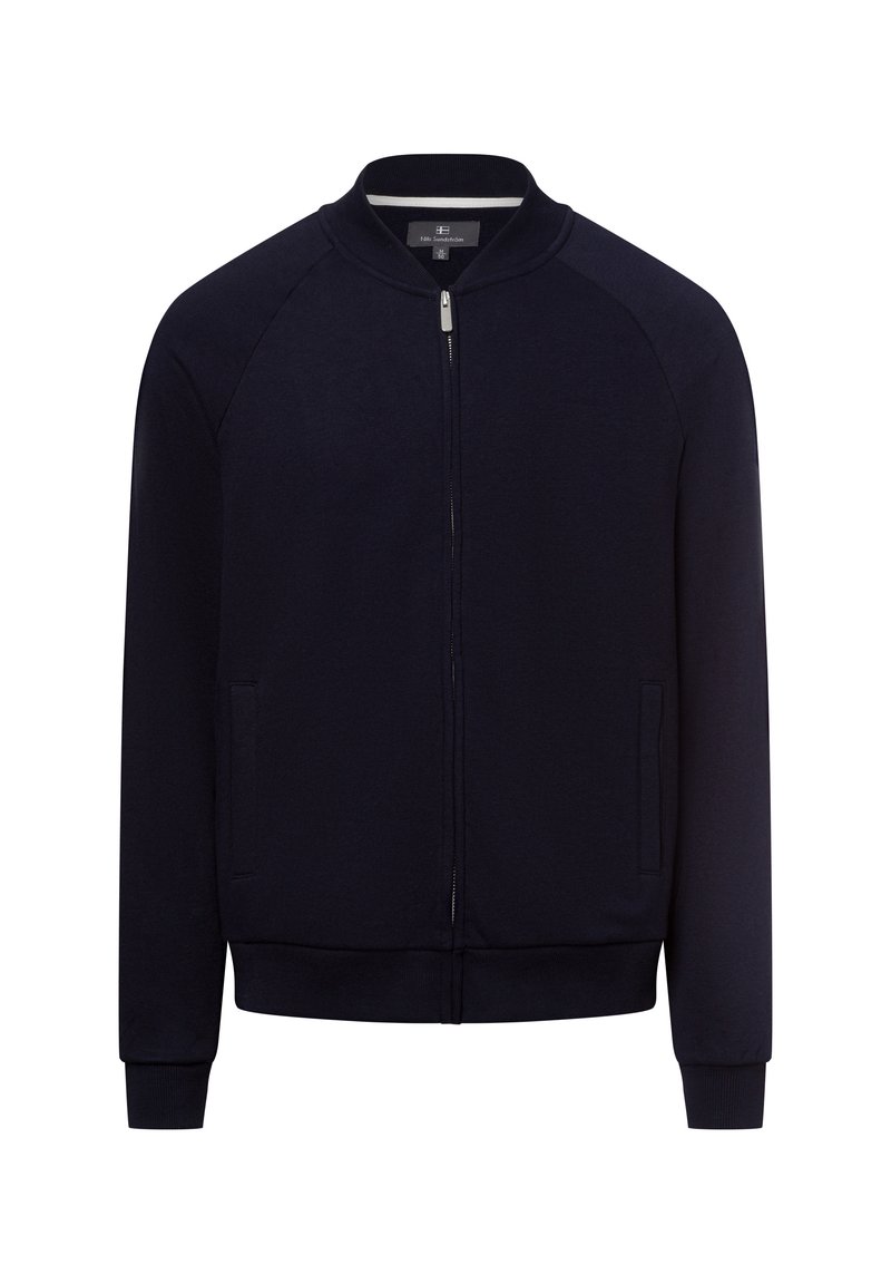 Navy zip-upjack met een gladde stof. Kenmerken zijn raglanmouwen, een geribbelde kraag, zijzakken en een fitted zoom met elastische manchetten.