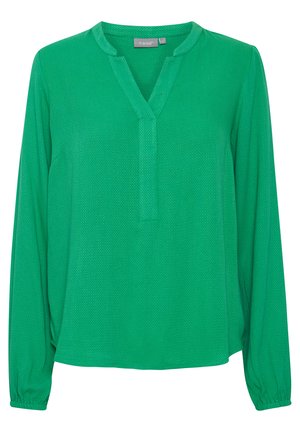 Blusa verde a maniche lunghe con colletto a V, tessuto texturizzato e polsini elasticizzati. Presenta una vestibilità rilassata e un motivo sottile.