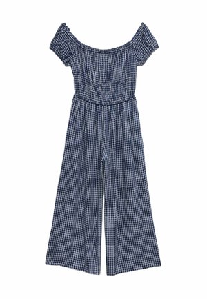 Tuta blu navy con spalle scoperte, maniche corte e motivo a griglia bianca, con vita aderente e pantaloni a gamba larga.