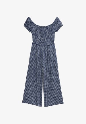 Tuta blu navy con spalle scoperte, maniche corte e motivo a griglia bianca, con vita aderente e pantaloni a gamba larga.