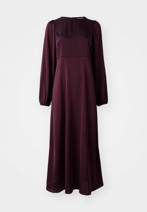 Abito lungo a maniche lunghe in tessuto burgundy scuro. Texture liscia, scollatura rotonda, maniche arricciate e chiusura con zip sul retro.