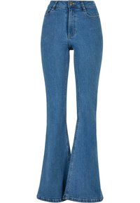 Jeans s proširenim nogavicama u srednje plavoj boji s visokom strukom. Sadrži ušivene detalje i blago teksturiranu tkaninu za dodatnu izdržljivost.