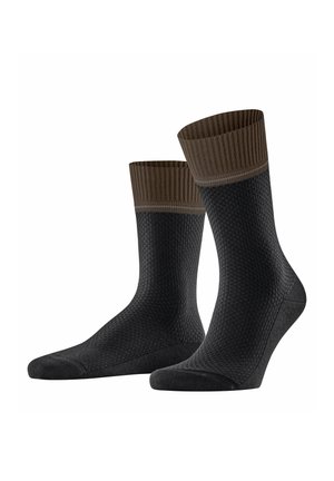 FALKE WINTERFELL - Socken - black
