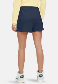 Fila APPAREL BUCHLOE HIGH WAISTED - Trainingsbroek - black iris