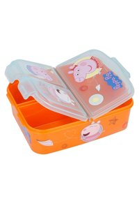 Boîte à lunch en plastique orange avec deux compartiments, couvercle transparent illustré de motifs de cochons de dessin animé et d'accents colorés. Texture de surface lisse.