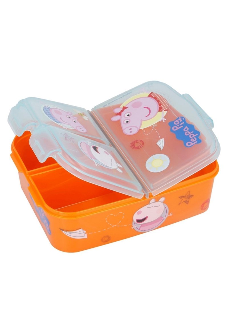 Boîte à lunch en plastique orange avec deux compartiments, couvercle transparent illustré de motifs de cochons de dessin animé et d'accents colorés. Texture de surface lisse.