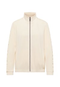 Chaqueta de cremallera color crema con cuello alto, puños acanalados y acentos de logo a lo largo de las mangas. Tejido suave y corte relajado.