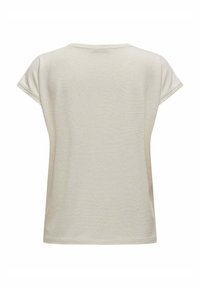 Top beige a maniche corte con un motivo a coste testurizzato e scollatura rotonda. Taglio dritto con vestibilità rilassata, privo di dettagli aggiuntivi.