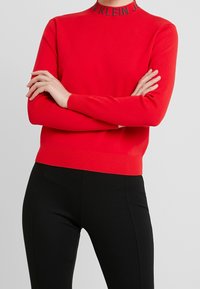 Calvin Klein Jeans Neule - red