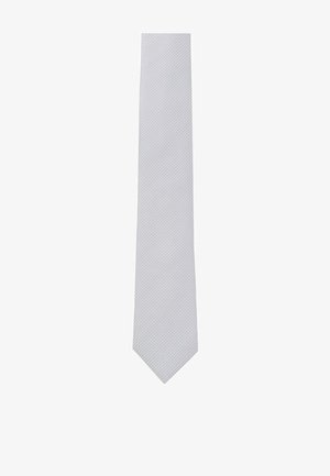 Silk tie in light grey with a subtle textured pattern, tapering to a pointed end. The smooth surface reflects light slightly, enhancing its appearance.