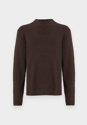 Brun strikket genser med rund hals, lange ermer og ribbestrikkede mansjetter og kant. Myk tekstur med ensfarget og uten mønster.