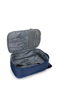 Námořnická modrá cestovní organizér s šedým interiérem, zipovanou sekcí, elastickými smyčkami a nastavitelnými popruhy pro zabezpečení obsahu uvnitř.