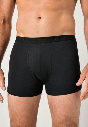 Boxer in cotone nero con una texture liscia e una cintura elastica con il nome del marchio "JP1880" in rilievo.