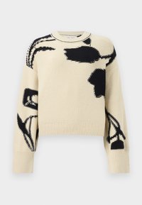 Μακρυμάνικη πλεκτή μπλούζα σε κρεμ χρώμα με μαύρα αφηρημένα λουλουδένια σχέδια, ριμπ μανσέτες και τελείωμα, στρογγυλή λαιμόκοψη.