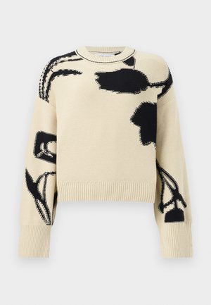 Μακρυμάνικη πλεκτή μπλούζα σε κρεμ χρώμα με μαύρα αφηρημένα λουλουδένια σχέδια, ριμπ μανσέτες και τελείωμα, στρογγυλή λαιμόκοψη.