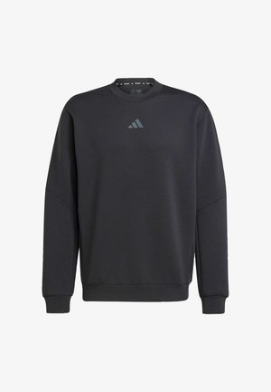 Sort sweatshirt lavet af blødt stof, med rund hals, ribbede manchetter og et diskret Adidas-logo i mørkegrå på brystet.