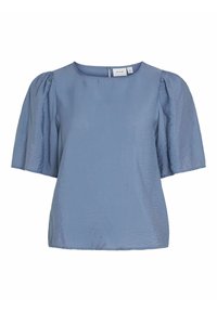 Blouse bleu clair avec un col rond, des manches courtes bouffantes et un tissu texturé. Elle possède une fermeture éclair au dos et un ourlet droit.