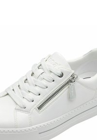 White leather sneaker with textured toe box, lace-up front, side zipper detail, and a textured rubber sole with a contrasting stripe.