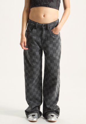 Vans NOVELTY PUDDLE czarny