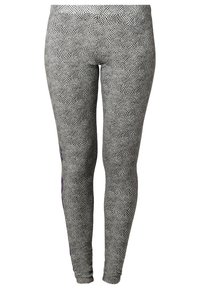 Svarta och vita leggings gjorda av stretchigt material, med ett rutmönster, en kroppsnära passform och en kontrasterande lila detalj på sidan.