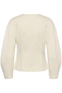Sweat-shirt crème à manches longues avec une coupe légèrement courte et un design dos simple avec des détails de couture sur fond blanc.