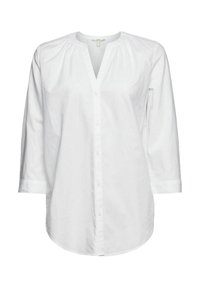Chemise en coton blanc à manches longues, boutonnée à l'avant, avec un col rond. Présente des détails froncés le long des épaules et un ourlet arrondi.