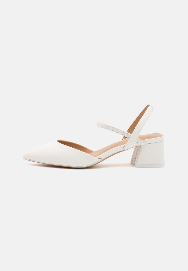 White slingback shoe with a pointed toe and low block heel. Made of smooth synthetic material, featuring an elastic strap for fit.