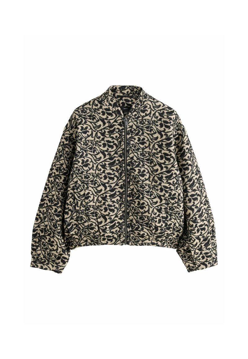 Beige and black patterned zip-up jacket with long sleeves and a ribbed collar, displayed against a white background.