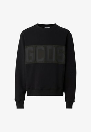 Felpa nera a maniche lunghe con polsini e orlo a costine, caratterizzata da una fascia orizzontale scura sul petto con lettere GCDS in rilievo.