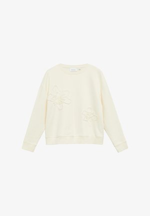 Kremowa bluza z długim rękawem, okrągłym dekoltem i subtelnym kwiatowym haftem na przodzie, wykonana z miękkiego materiału.