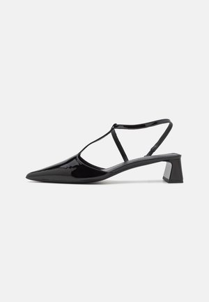 Black patent leather slingback shoes with a pointed toe, adjustable strap, and a square mid-heel. Smooth texture with a glossy finish.