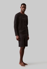 Calvin Klein Underwear LOGO - Pyjamasoverdel - black