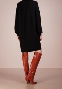 DRYKORN Pletené šaty - black