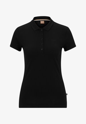 Svart polo skjorta i bomull, med klassisk krage, korta ärmar, en rad knappar och en subtil varumärkeslogotyp på bröstet.