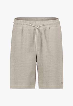 Beige strukturierte Strickshorts mit elastischem Bund und Kordelzug, ausgestattet mit zwei Seitentaschen und einem kleinen Markenpatch nahe dem Saum.