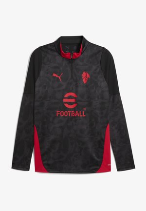 Haut d'entraînement au football à manches longues noir avec des accents rouges. Il présente un col zippé mi-hauteur, un motif texturé et des logos sur la poitrine et la manche.