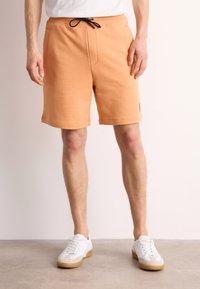 HUGO - Pantaloni de trening - medium orange Imagine miniatură 1