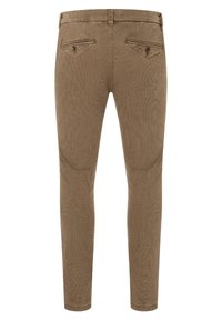 Brown, textured slim-fit trousers featuring two back pockets with button closures and a closed waistband, designed for a tailored look.