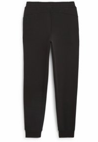 Černé sportovní kalhoty vyrobené z měkké tkaniny, s elastickým pasem, zúženými nohavicemi a manžetami na kotnících pro přiléhavý vzhled.