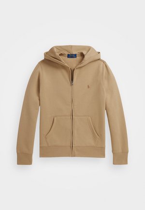 Hoodie beige en mélange de coton, avec une fermeture éclair à l'avant, des poches kangourou et un petit logo sur la poitrine. Texture lisse, tissu doux.