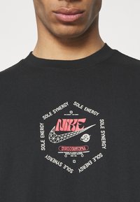 Nike Sportswear T-shirt med print - black