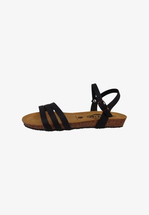 Sort flad sandal med tre forreste stropper, en korksål og en justerbar ankestropp med metalspænde.