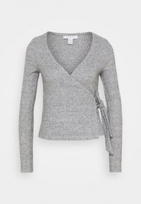 Grå omslagsblus i mjukt stickat tyg, med djup V-ringning, långa ärmar och en detalj med knyt på sidan.