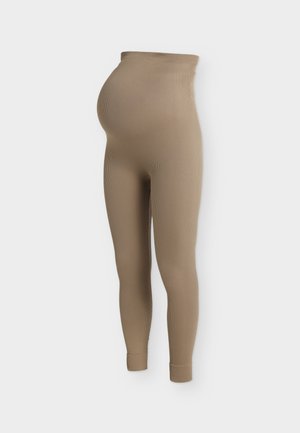 Legging de maternité côtelé beige avec taille haute, coupe ajustée, et espace supplémentaire pour ventre de femme enceinte, présenté sur un fond uni.