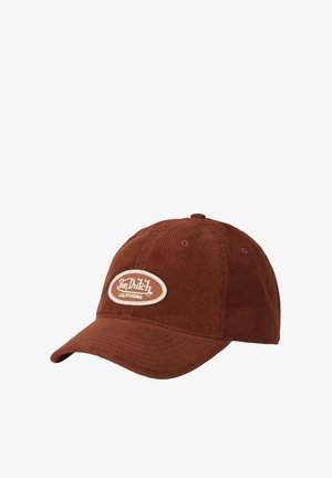 Casquette de baseball en velours côtelé marron avec un patch ovale crème portant le texte "Von Dutch California", visière courbée et détails cousus.