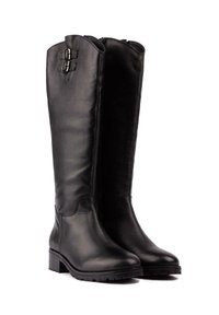 Knee-high black leather boots featuring two decorative buckles, a round toe, a textured sole, and a smooth finish. Zipper closure on one side.