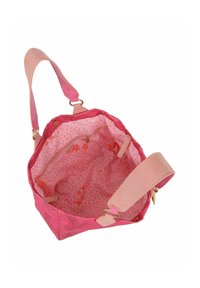 Roze canvas tas met een gladde leren schouderband en gouden hardware. Het interieur heeft een bloemenpatroon op een lichtroze achtergrond met een ritsvak.